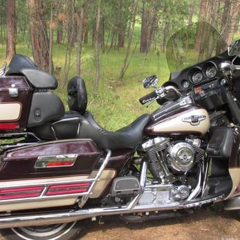 Teddy's Sports Grill - a motorcycle parked in the woods - Sports Bars Near Me - Rapid City, South Dakota Teddy's Sports Grill - a motorcycle parked in the woods - Sports Bars Near Me - Rapid City, South Dakota