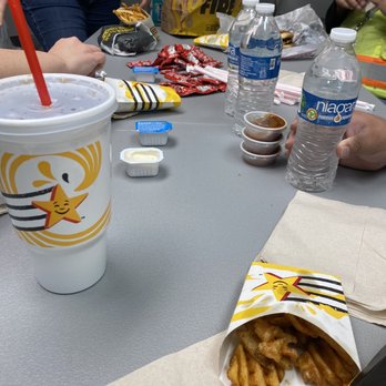 Carl's Jr. - a table full of food and drinks - Burgers Near Me - Phoenix, Arizona