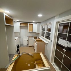 Square Up Construction - New cabinets in this cape renovation