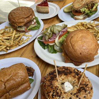 The Butchers Son - Bottom right: Fried Chicken Bagelwich Middle right: Bacon Cheese Burger! with Cheddar and Garlic Fries Top right: Killer B.L.A.T - Salad Near Me - Berkeley, California
