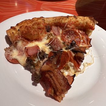 Mellow Mushroom - Medium Mighty Meat pizza.  Bacon. Sausage. Ham. Pepperoni. Loads of cheese. The dough is out of this world!!! - Bars Near Me - Branson, Missouri