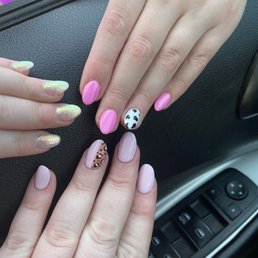 Translucent nails, leopard print nail, and cow print nail.
