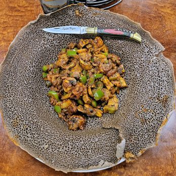 Ranch Side Cafe - Awazè Tibs with beef & button mushrooms; spongy Injera bread - American Near Me - Sylmar, California Ranch Side Cafe - Awazè Tibs with beef & button mushrooms; spongy Injera bread - American Near Me - Sylmar, California