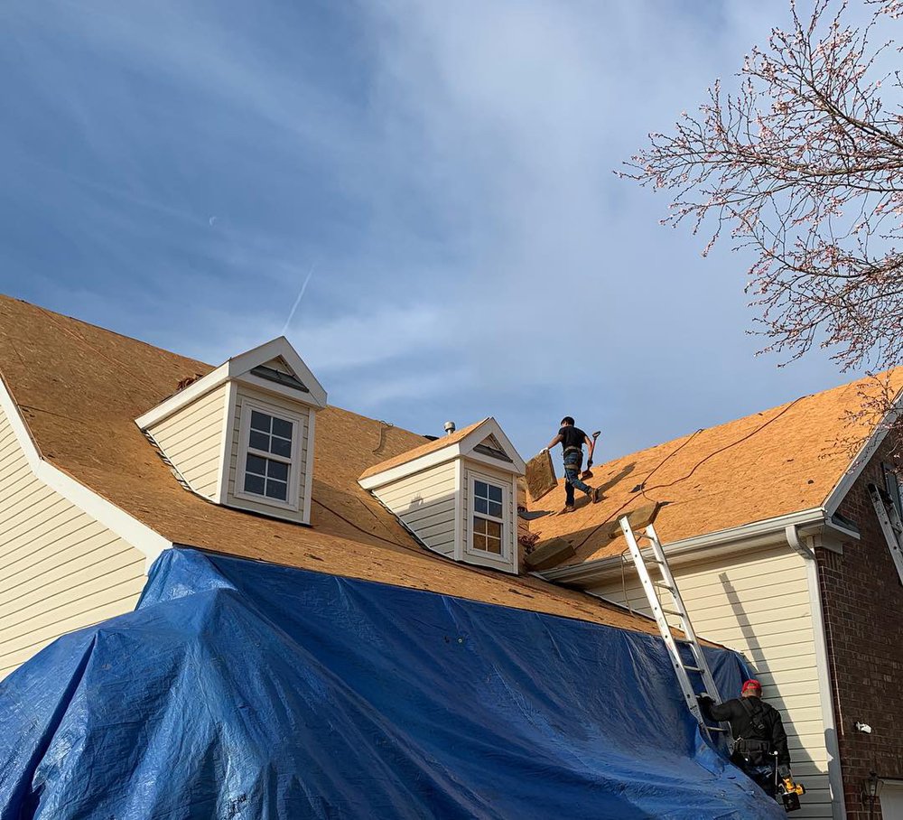 Slide of Spartan Roofing Solutions