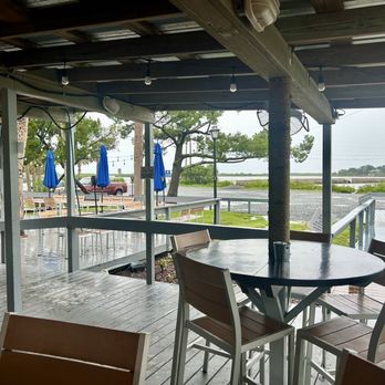 Peck's Old Port Cove - Outdoor seating. - Seafood Near Me - Crystal River, Florida Peck's Old Port Cove - Outdoor seating. - Seafood Near Me - Crystal River, Florida