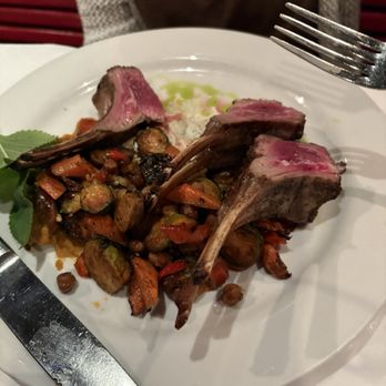 Ocean Boulevard Bistro & Martini Bar - Rack of lamb, merguez sausage, mixed veg medley, roasted Brussels sprouts - Bars Near Me - Kitty Hawk, North Carolina Ocean Boulevard Bistro & Martini Bar - Rack of lamb, merguez sausage, mixed veg medley, roasted Brussels sprouts - Bars Near Me - Kitty Hawk, North Carolina