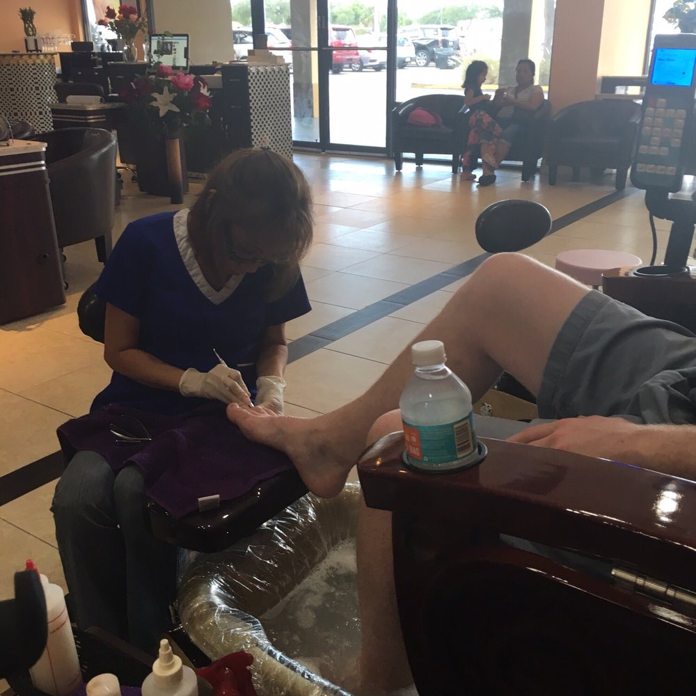 Oscar Nail Bar - Boy friend being pampered - Nail Salons Near Me - Clearwater, Florida