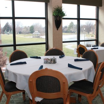 Water's Edge - a dining room with a view of a golf course - Breakfast & Brunch Near Me - Hesston, Kansas Water's Edge - a dining room with a view of a golf course - Breakfast & Brunch Near Me - Hesston, Kansas