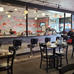 Coffee Cup - Dining room, counter, and front area seating.