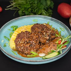 Arzan Cafe - Beef cutlets - Two beef cutlets, pan-fried and breaded, served with mashed potatoes