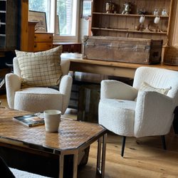 The Housatonic Trading Co - New faux sheepskin performance fabric modern club chairs, mixed with authentic mid century pieces and antiques.