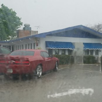 La Loma Coney Island - The front of the store for Old Village. It must have been a sign that it was raining that day. - American Near Me - Melbourne, Florida