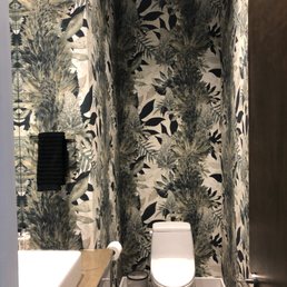 Wallpaper installed in a powder room