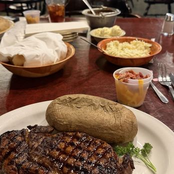 Cattleman's Steakhouse at Indian Cliffs Ranch - 14 ounce Hardy ribeye baked potato spicy ranch beans, pineapple coleslaw - Steakhouses Near Me - Fabens, Texas