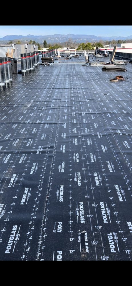 Slide of Husky Roofing