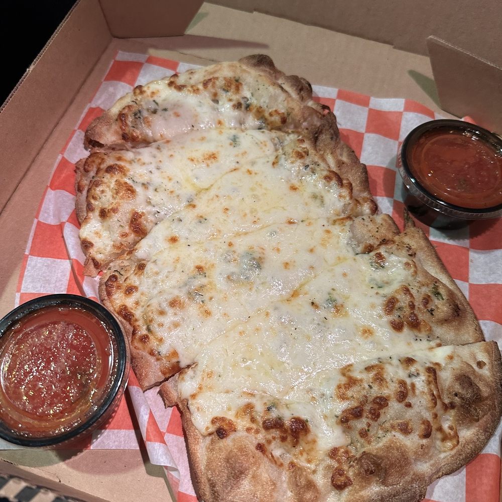 Pizza Novara - This claims to be the best cheesy bread. It's pretty good but I wouldn't call it the best. Wish it was a fluffier bread - Pizza Near Me - Bloomington, Minnesota Pizza Novara - This claims to be the best cheesy bread. It's pretty good but I wouldn't call it the best. Wish it was a fluffier bread - Pizza Near Me - Bloomington, Minnesota