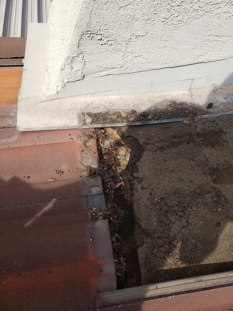 Slide of Art Roofing Plus