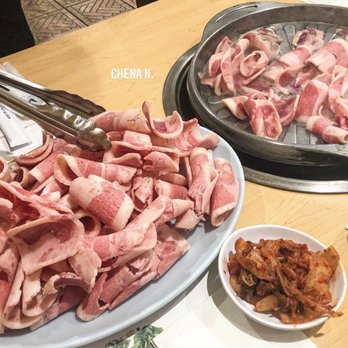 Sun Ha Jang - a plate of meat being prepared - Korean Near Me - Los Angeles, California Sun Ha Jang - a plate of meat being prepared - Korean Near Me - Los Angeles, California