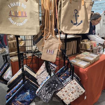 Warwick Mall - Books and otber cozy items like tea and tablet organizers at the Winter Farmers Market 2026 - Shopping Centers Near Me - Warwick, Rhode Island