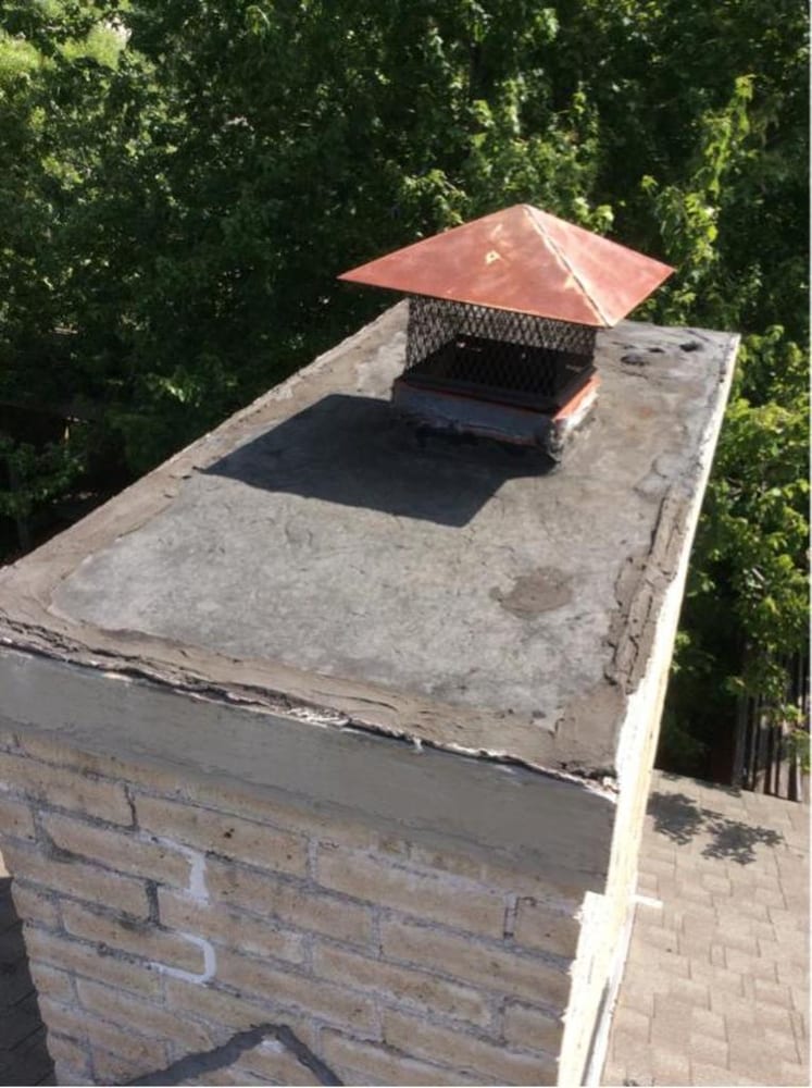 Slide of Coat of Arms Roofing