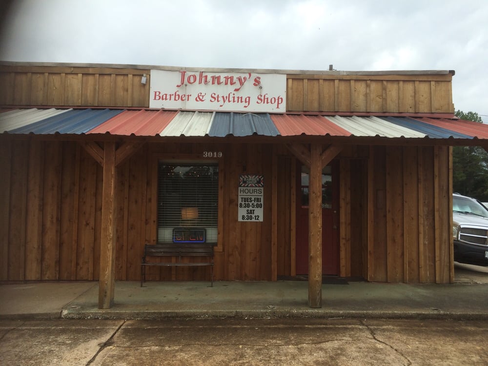Johnny's Barber & Styling Shop Logo