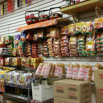Old Town Asia Market - Sauce and gravy mix pouches hanging on wall. - Grocery Near Me - Flushing, New York Old Town Asia Market - Sauce and gravy mix pouches hanging on wall. - Grocery Near Me - Flushing, New York