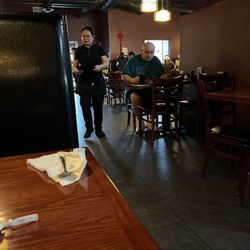 Yuan's Buffet - Inside view. A bit dark for my taste. Tables & chairs have seen better days