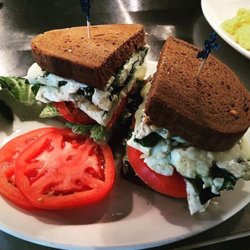 Sunset Grill - Our Sunset Healthy Sandwich on Dark Rye with a side of freshly sliced tomatoes.