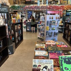 The Bookmark - The view from the entrance of the shop. Many new books, the newest arrivals are in the foreground.