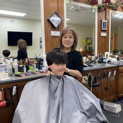 Jens Barbershop - Fun and friendly people working here. Excellent service and great looking haircut! Probably can turn a Frog into a Prince!