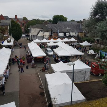 Levenshulme Market - View from the train platform shows the whole market area, which is uncovered. - Market Stalls Near Me - Manchester, XGM