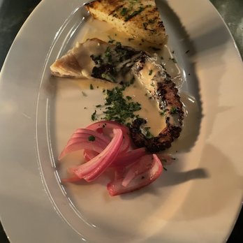 Grappa - Grilled octopus. Such a well balanced dish, with the beurre blanc sauce and the pickled onions. A must try! - Mediterranean Near Me - Seattle, Washington Grappa - Grilled octopus. Such a well balanced dish, with the beurre blanc sauce and the pickled onions. A must try! - Mediterranean Near Me - Seattle, Washington
