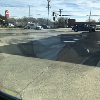 Schlotzsky's - Holes in parking lot - Delis Near Me - Anderson, South Carolina Schlotzsky's - Holes in parking lot - Delis Near Me - Anderson, South Carolina