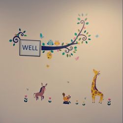Dacula Pediatrics - Wellness waiting room wall , designed by our staff, Angel!