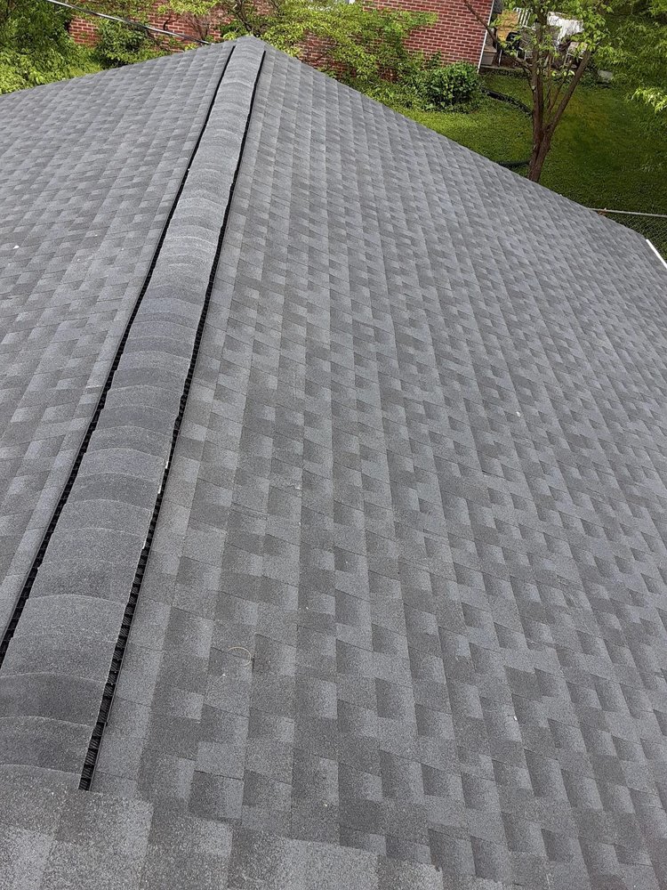 Slide of C & J Roofing