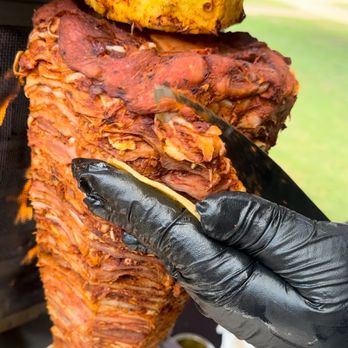 Romeros Catering - Delicious trompo meat "marinated pork" - Caterers Near Me Romeros Catering - Delicious trompo meat "marinated pork" - Caterers Near Me