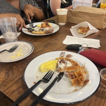 The Grind Coffeehouse - Buttermilk waffle with pecans and whipped cream and eggs. - Coffee & Tea Near Me - Cedar City, Utah The Grind Coffeehouse - Buttermilk waffle with pecans and whipped cream and eggs. - Coffee & Tea Near Me - Cedar City, Utah