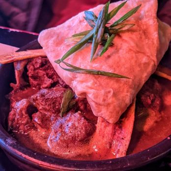 Oyo - Goat curry and dhalphourie roti - Latin American Near Me - Pleasanton, California