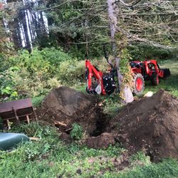 Bell Creek Equipment - Digging a stump up