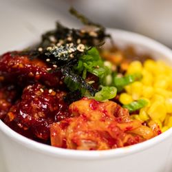 K Manna - Korean Fried Chicken (Boneless) cupbap. Comes with white rice, corn, japchae, and our homemade kimchi topped with green onions, seaweed.