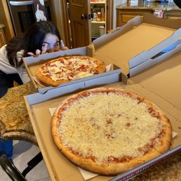 Thick crust pepperoni thin crust cheese and Elicia's house salad Thick crust pepperoni thin crust cheese and Elicia's house salad