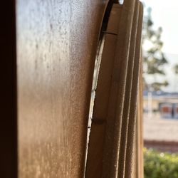 Designer Door & Window - Window frame is separating from door, nails showing and popping out.