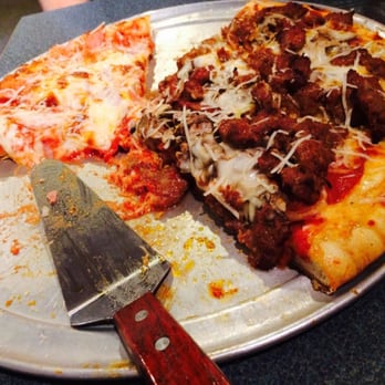 Second Avenue Pizza - The sausage is spicy!  My lips were burning, but it was delicious! - Pizza Near Me - Sandpoint, Idaho