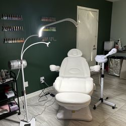 Dollhouse Collective Nails and Beauty - I use this specific chair for dry pedicures because they fully recline, support the back and neck and adjust leg position.