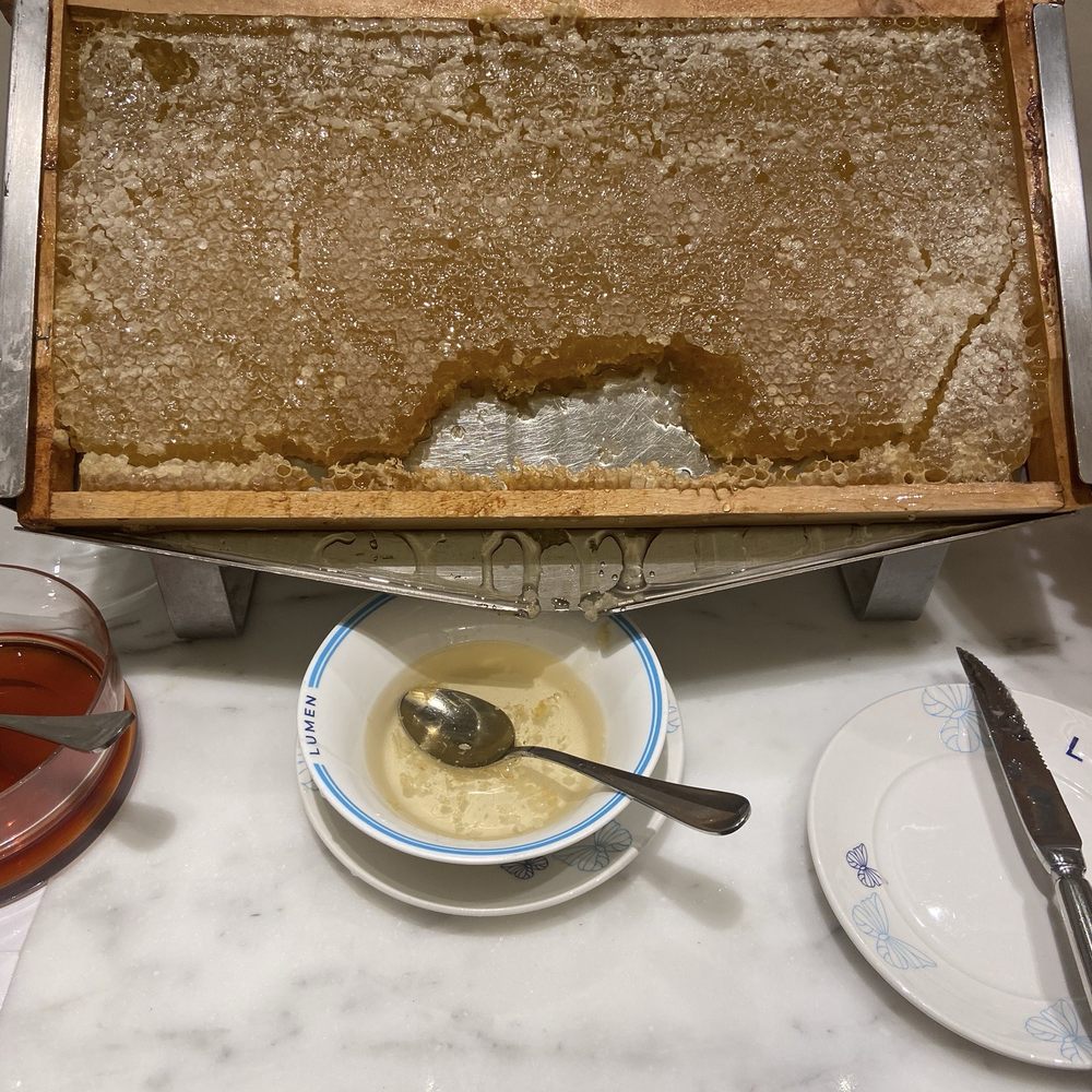 Fresh honey dripping from actual honeycomb.  Impressive.