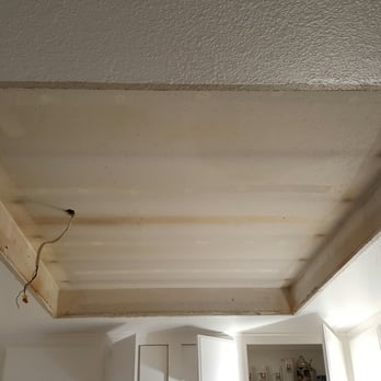 Smart Painting - This is the before picture of the area which formally had fluorescent lights in the kitchen. - Painters Near Me - Sunnyvale, California Smart Painting - This is the before picture of the area which formally had fluorescent lights in the kitchen. - Painters Near Me - Sunnyvale, California