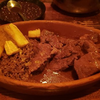 Cuban Pete's - Ricky Ricardo's Ribs ($14.95) with Fried Yucca and Arroz con Gandules - Cuban Near Me - Montclair, New Jersey