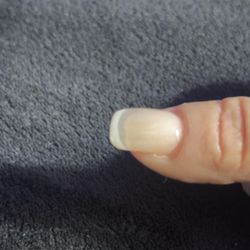 Daisy Nails & Spa - You shouldn't be able to see a transparent nail with a French nail service. There wasn't enough color put on the nail.