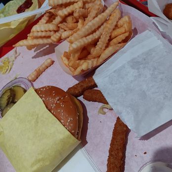 Frosty Queen - Plain cheese burger (.99 cents to add cheese to burger), 2 fries from family meal and fried zucchini. - Burgers Near Me - Madera, California