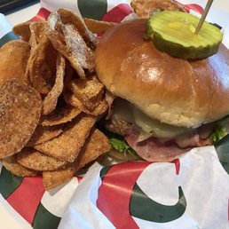 Cuban burger with side of chips Cuban burger with side of chips